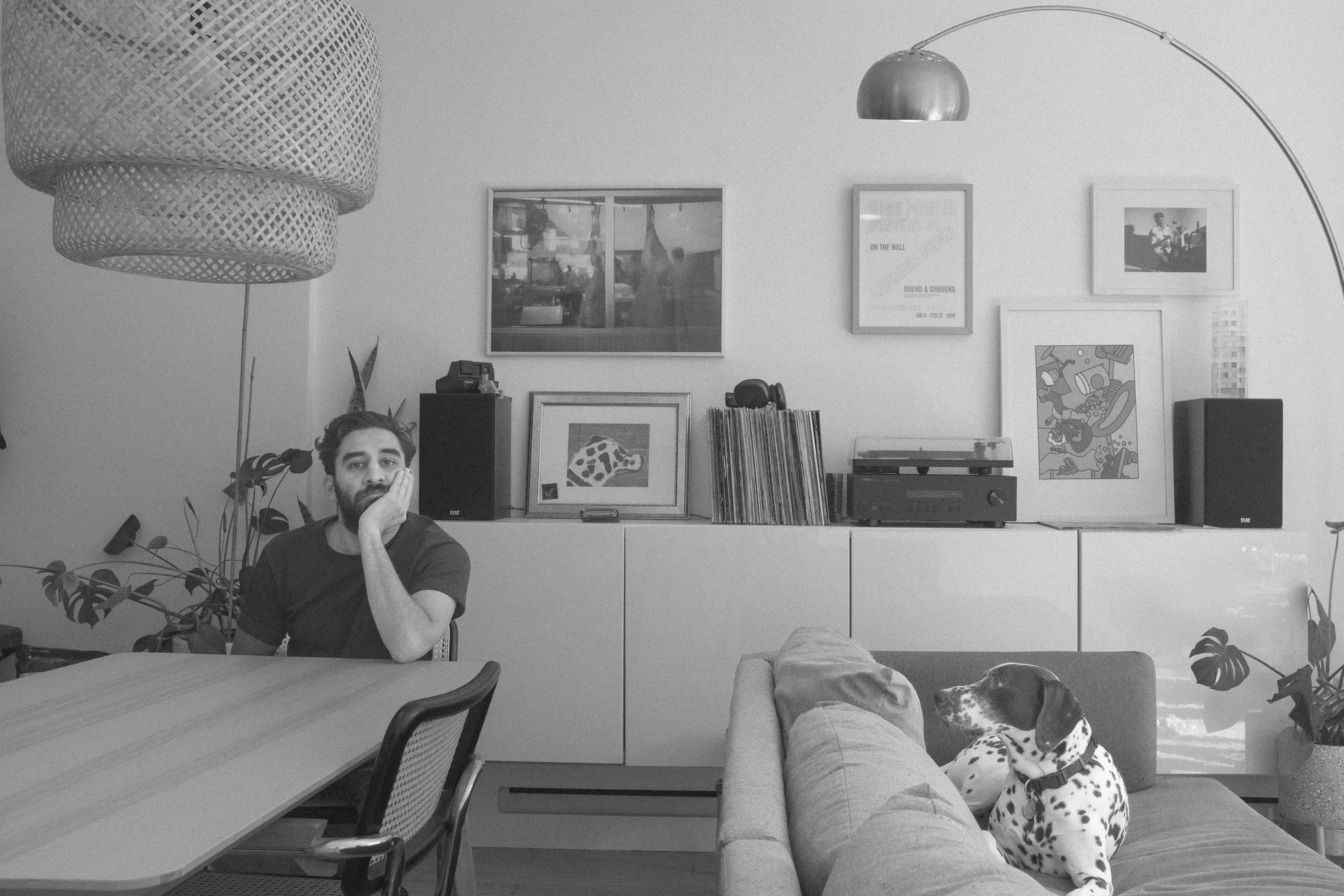 Kamil Tyebally, founder of Early Spring, at home with his dog