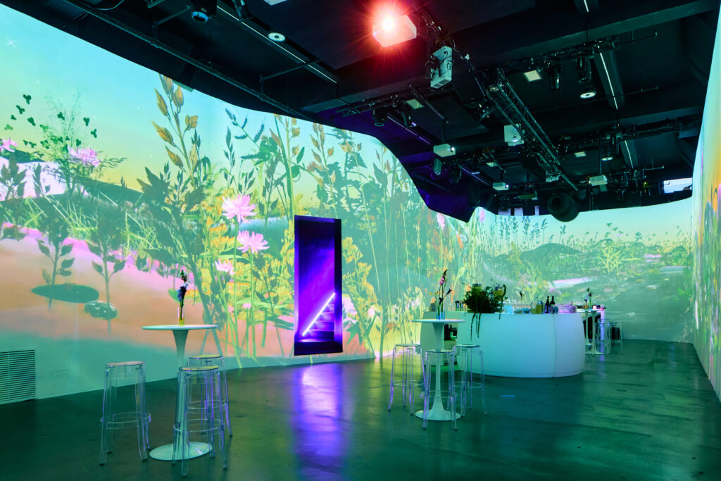 Pixel As Seed installation for Montauk Capital at NYC Climate Week 2024 — immersive digital art and land conservation experience by Diana Lynn VanderMeulen.